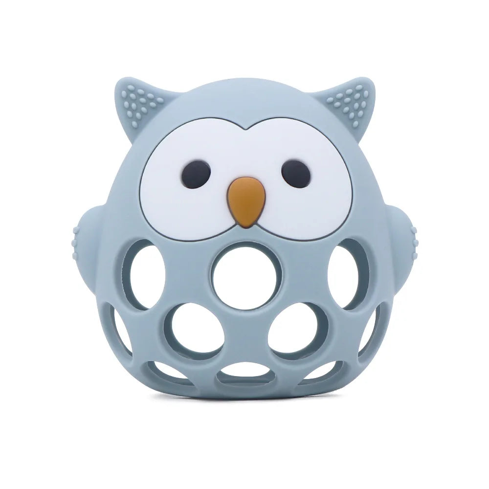 Blue owl-shaped teething toy on a white background