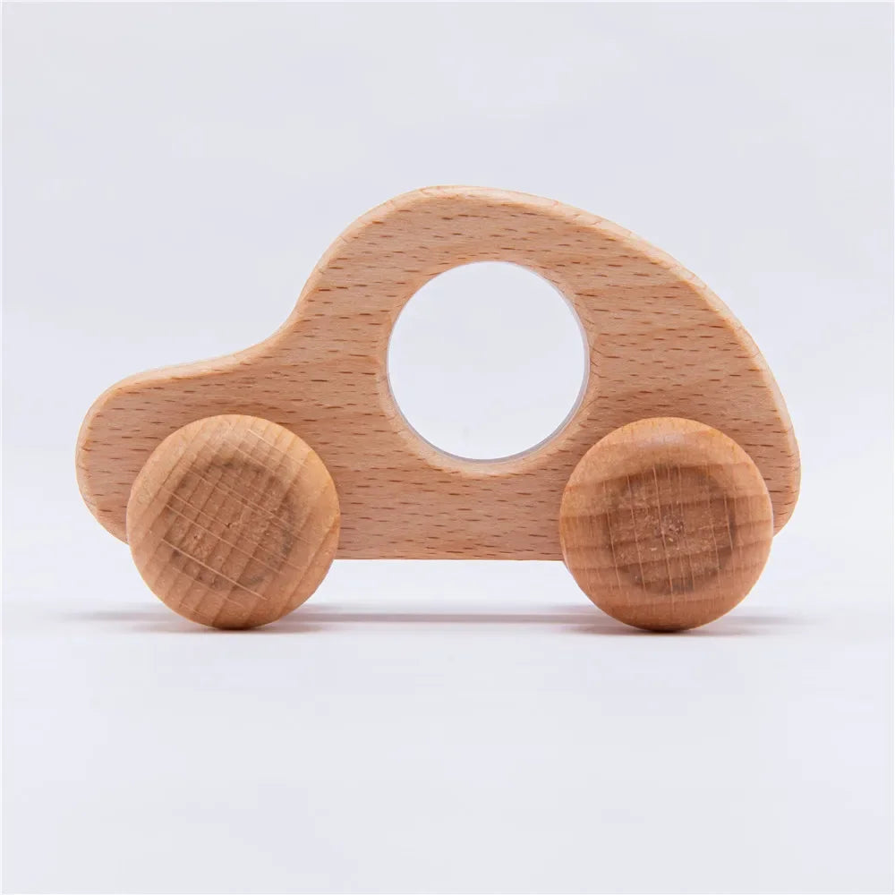 Wooden toy car on a white background
