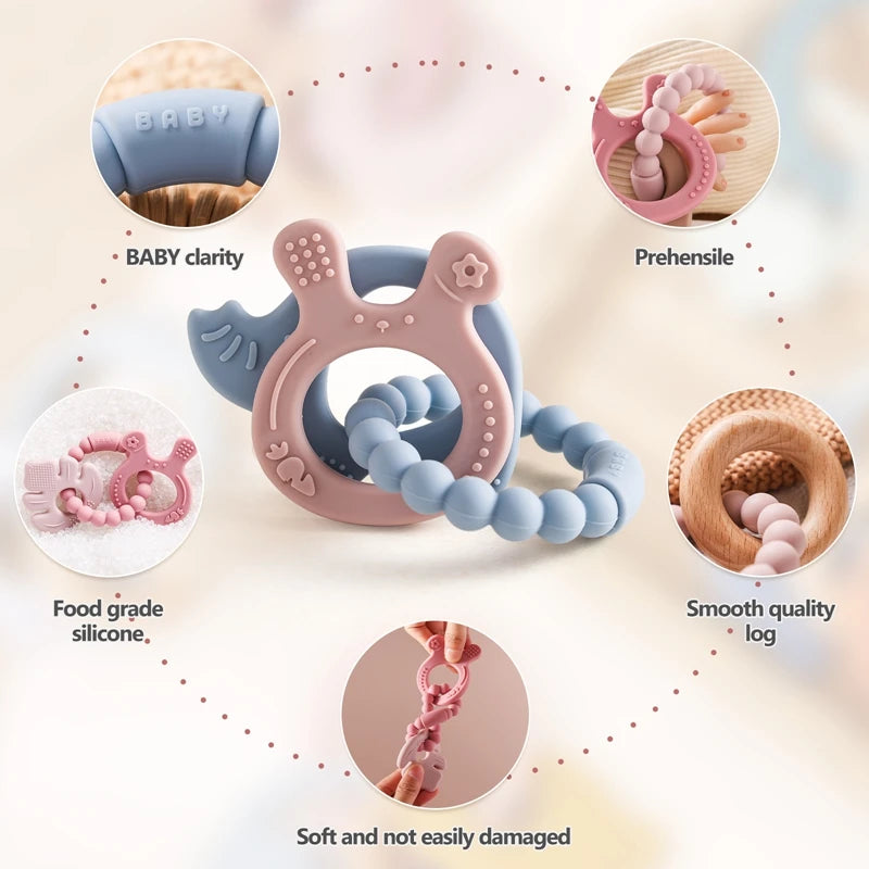 Teething ring with pink and blue colors, featuring text on its features.