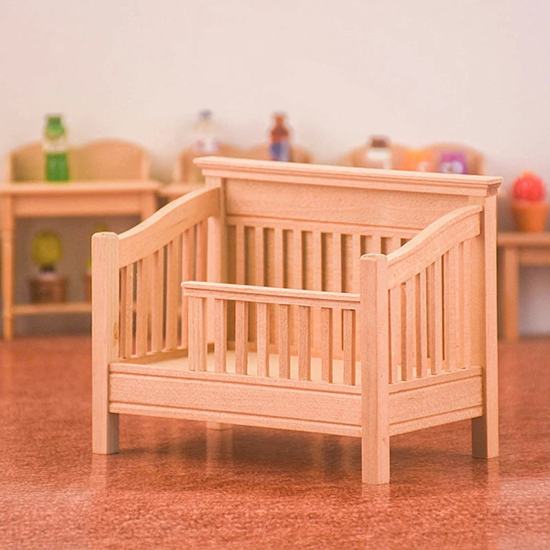 Wooden crib in a toy setting with blurred background