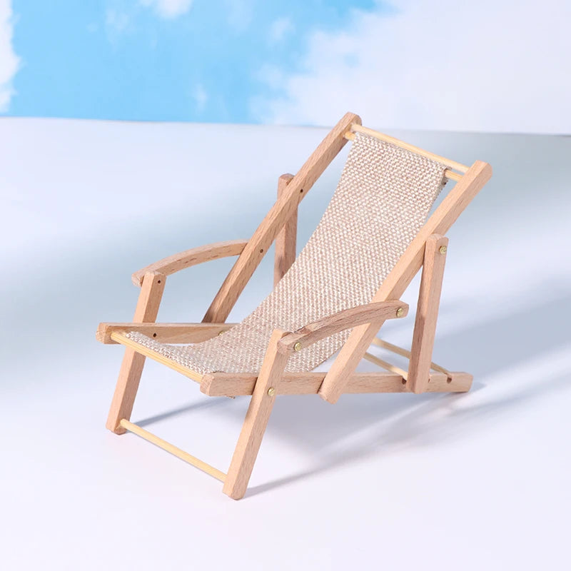 Wooden deck chair with woven seat on a light blue background