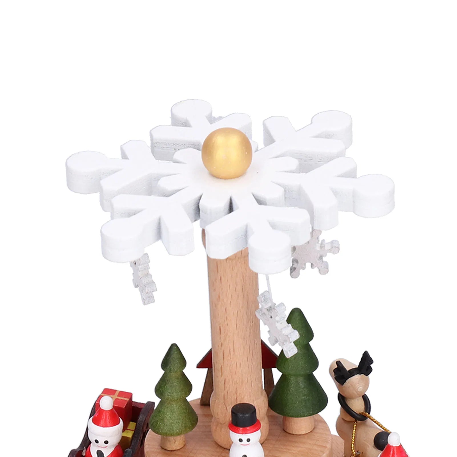 Wooden figurine with a snow-covered hat and various small figures on a white background