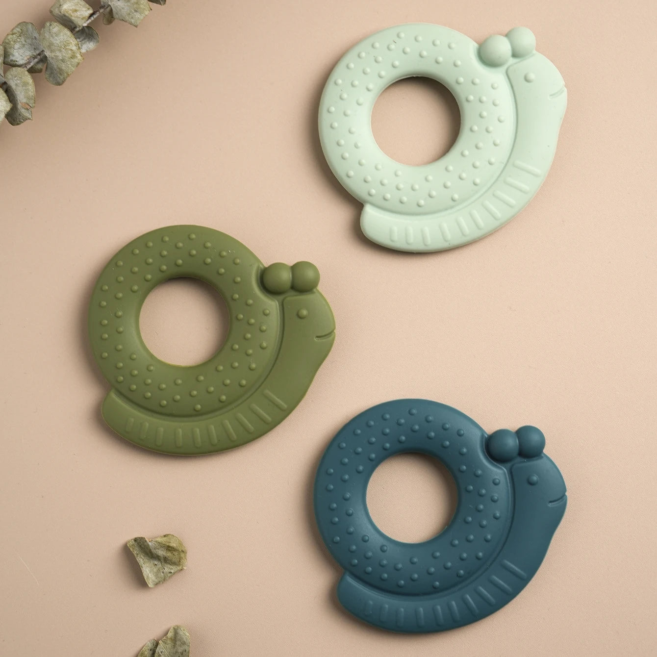 Snail silicone teethers in mint, olive and teal