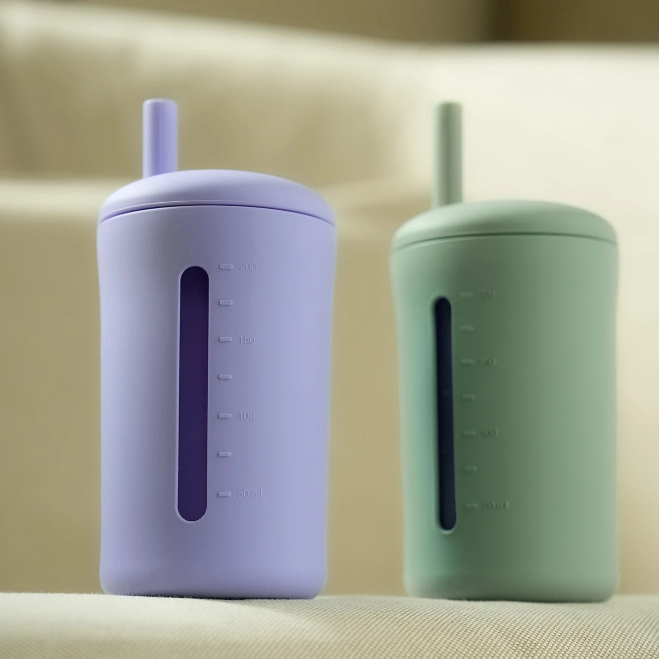 Close-up of lavender and sage straw cups showing the window strip
