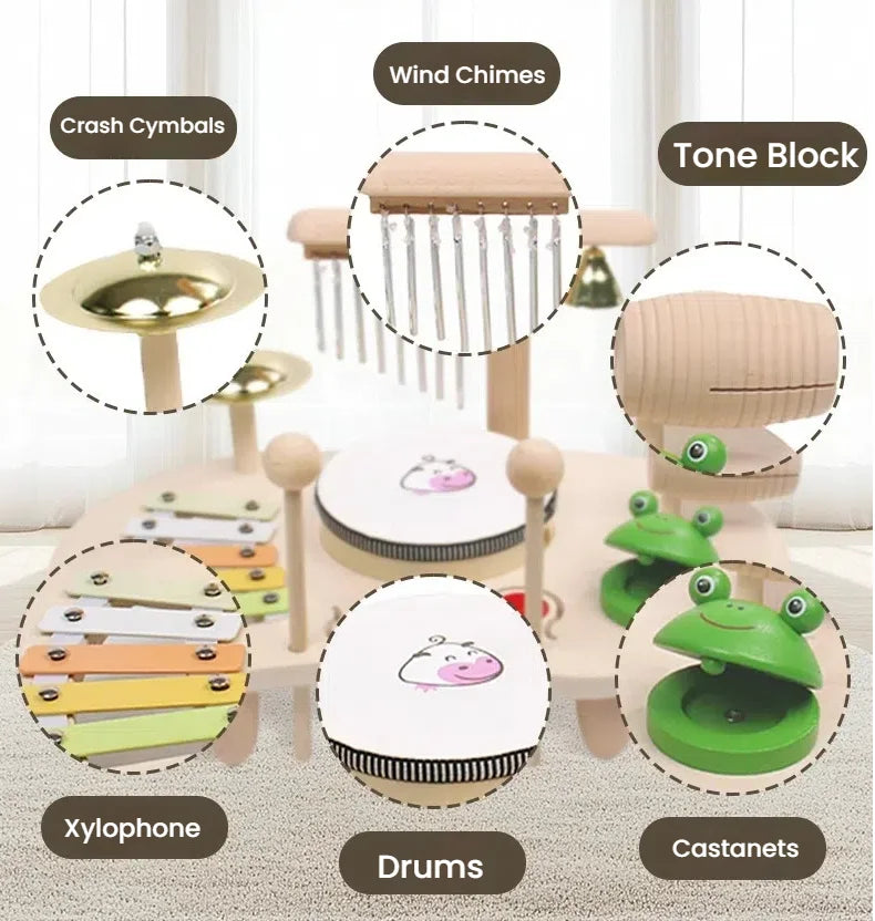 Set of wooden musical instruments including crash cymbals, wind chimes, tone block, xylophone, drums, and castanets on a neutral background.