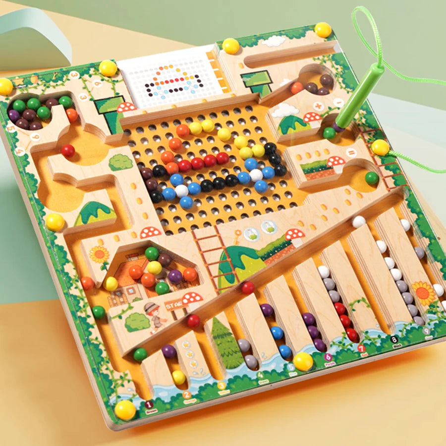 Wooden educational toy with colorful beads on a green background