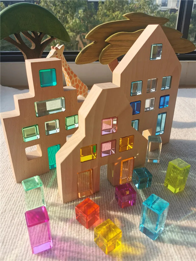 Wooden buildings with colorful transparent blocks on a textured surface