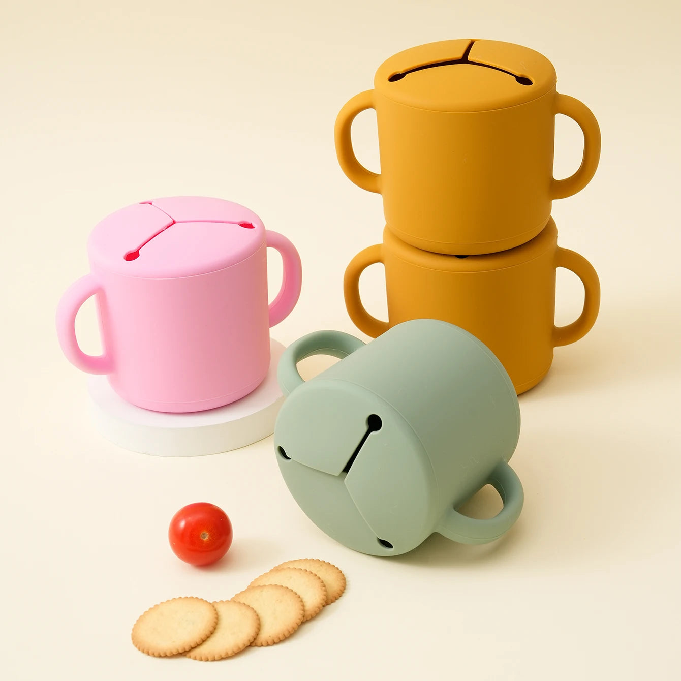 Pink, sage and mustard silicone snack cups with crackers
