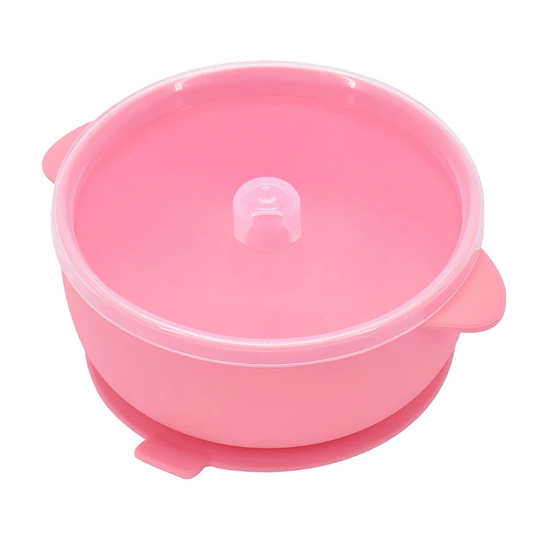 Hot pink two-handle suction bowl with clear lid