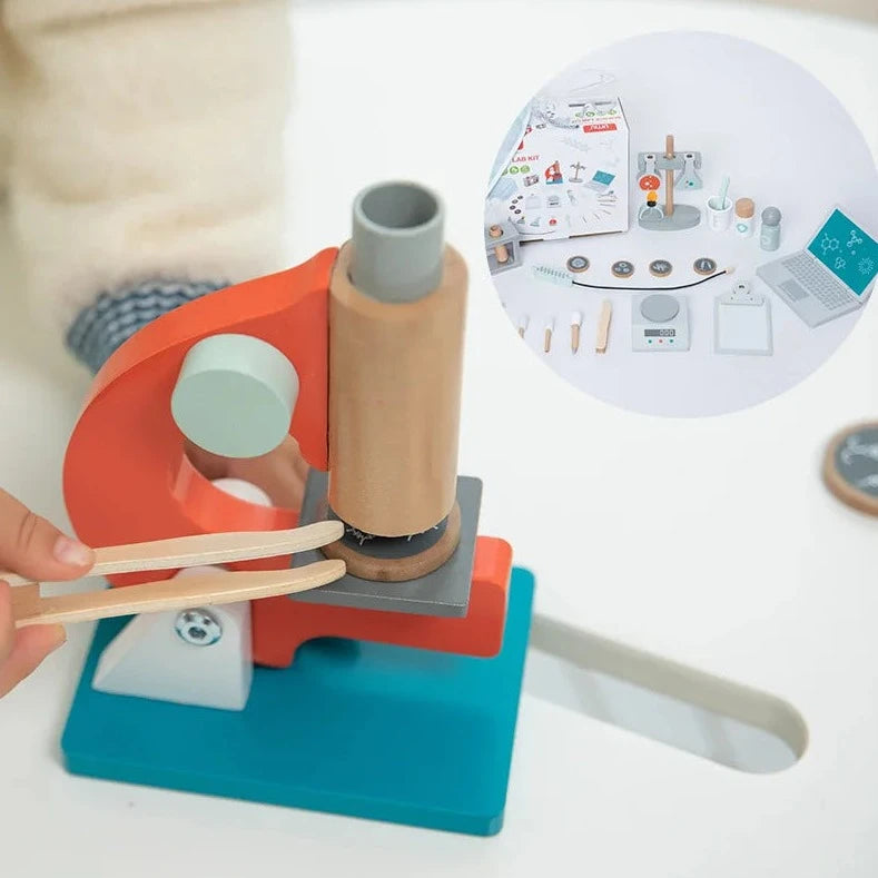 Close-up of the Pretend Play Microscope Set, showcasing a wooden microscope and tools, designed to inspire young biologists through educational play.