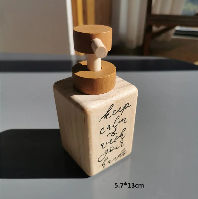 Decorative bottle with wooden top on a gray surface, featuring text and dimensions.