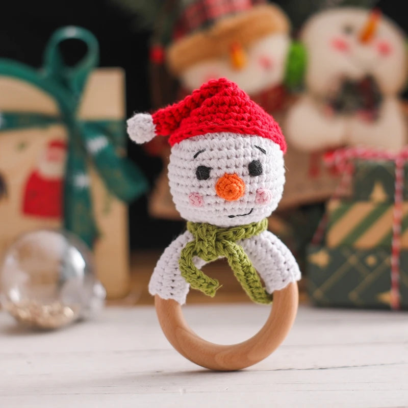 Crochet Snowman & Reindeer Rattle Toy with wooden teether, featuring a handmade snowman design, perfect for holiday-themed sensory play.