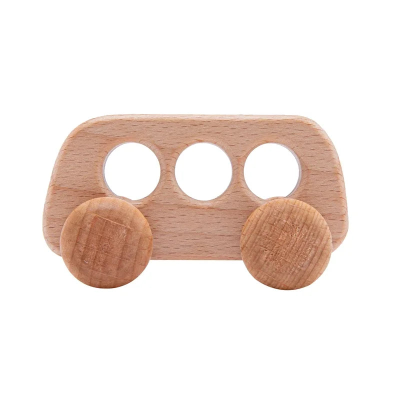 Wooden toy car with three circular windows and two round wheels on a white background