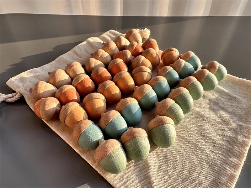 Colorful acorn-shaped objects on a textured surface