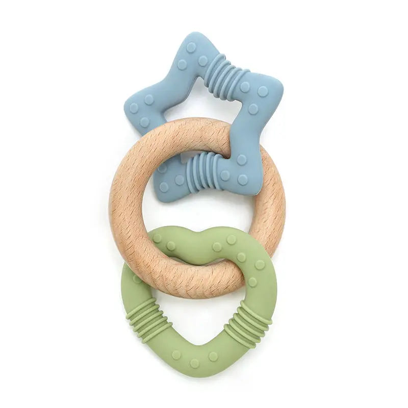 Teething ring with wooden and silicone components on a white background