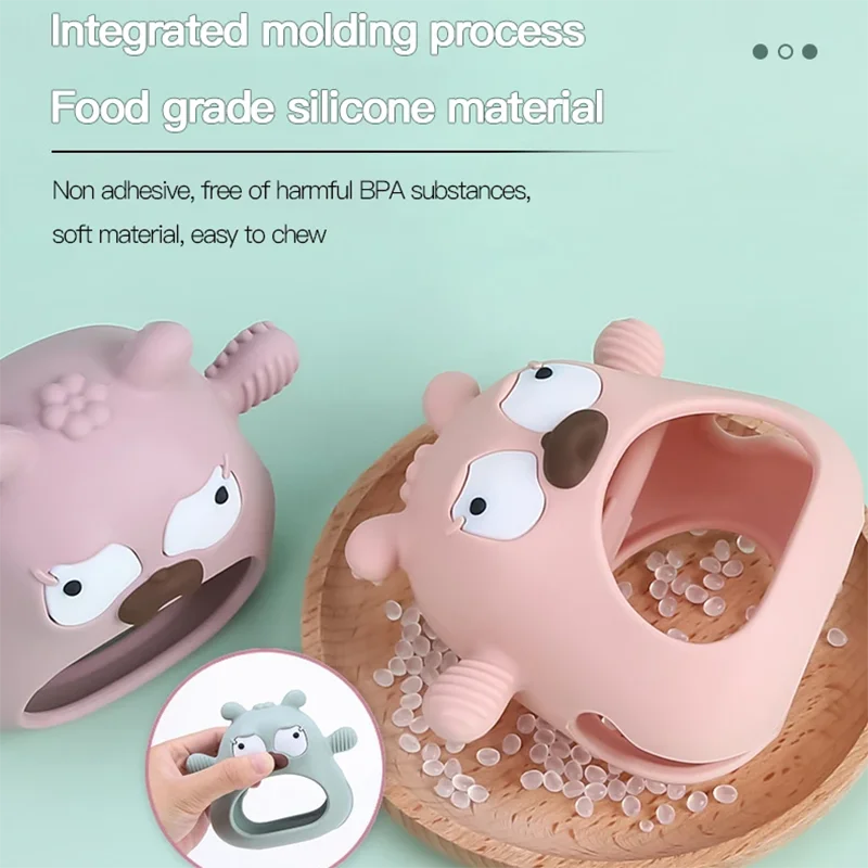 Two pink silicone toys with a bear design on a light green background, featuring text about food-grade silicone material.