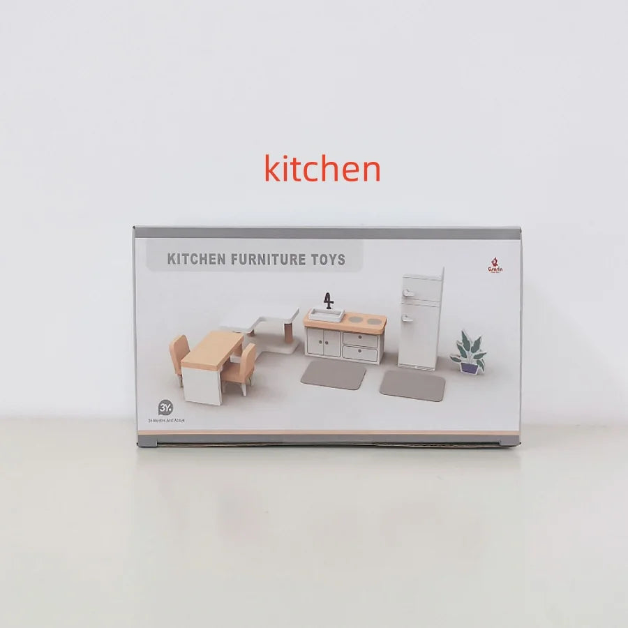 Box of kitchen furniture toys on a white background