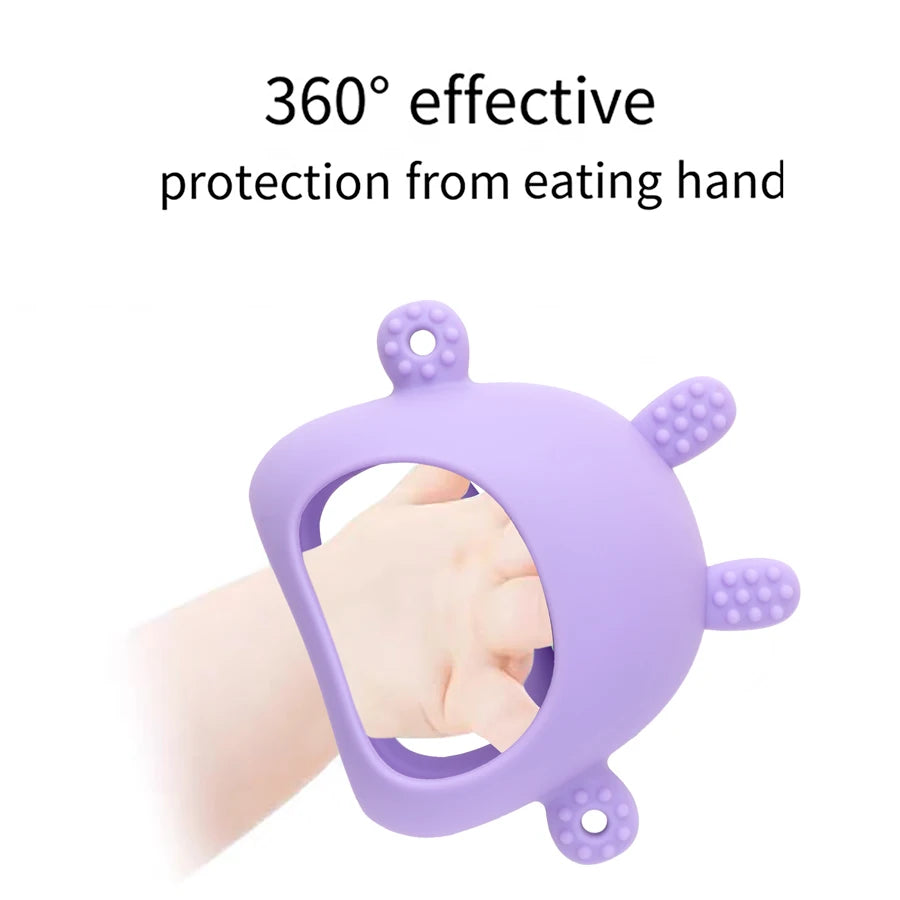 Baby hand inside a lavender bunny teething mitten