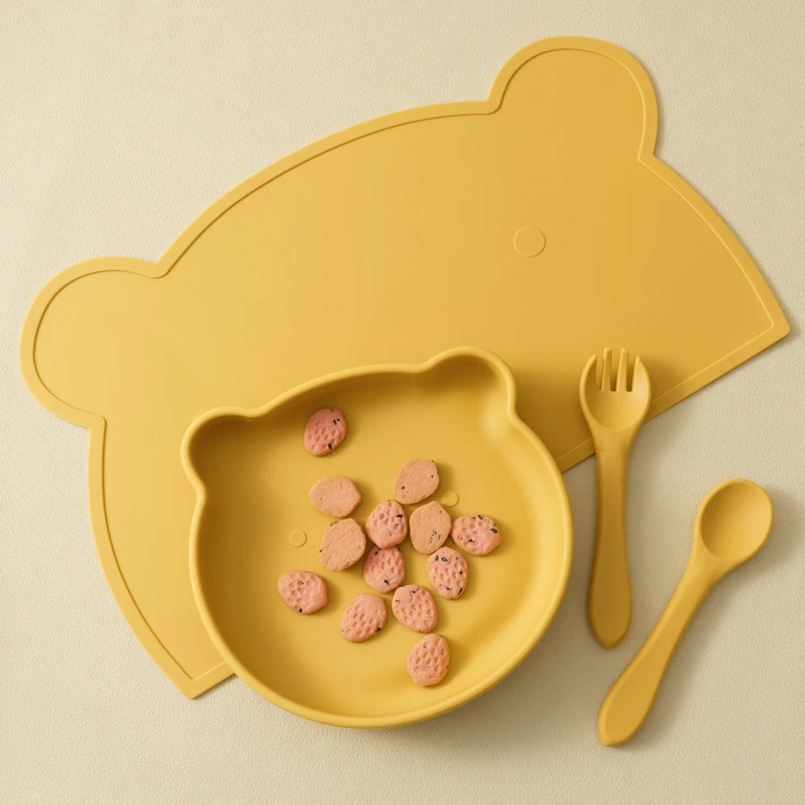 Mustard bear placemat with plate, spoon and fork