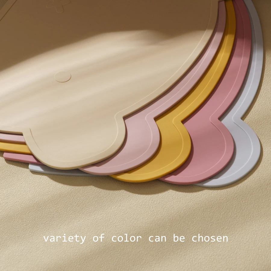 Edges of bear placemats fanned out in five colors