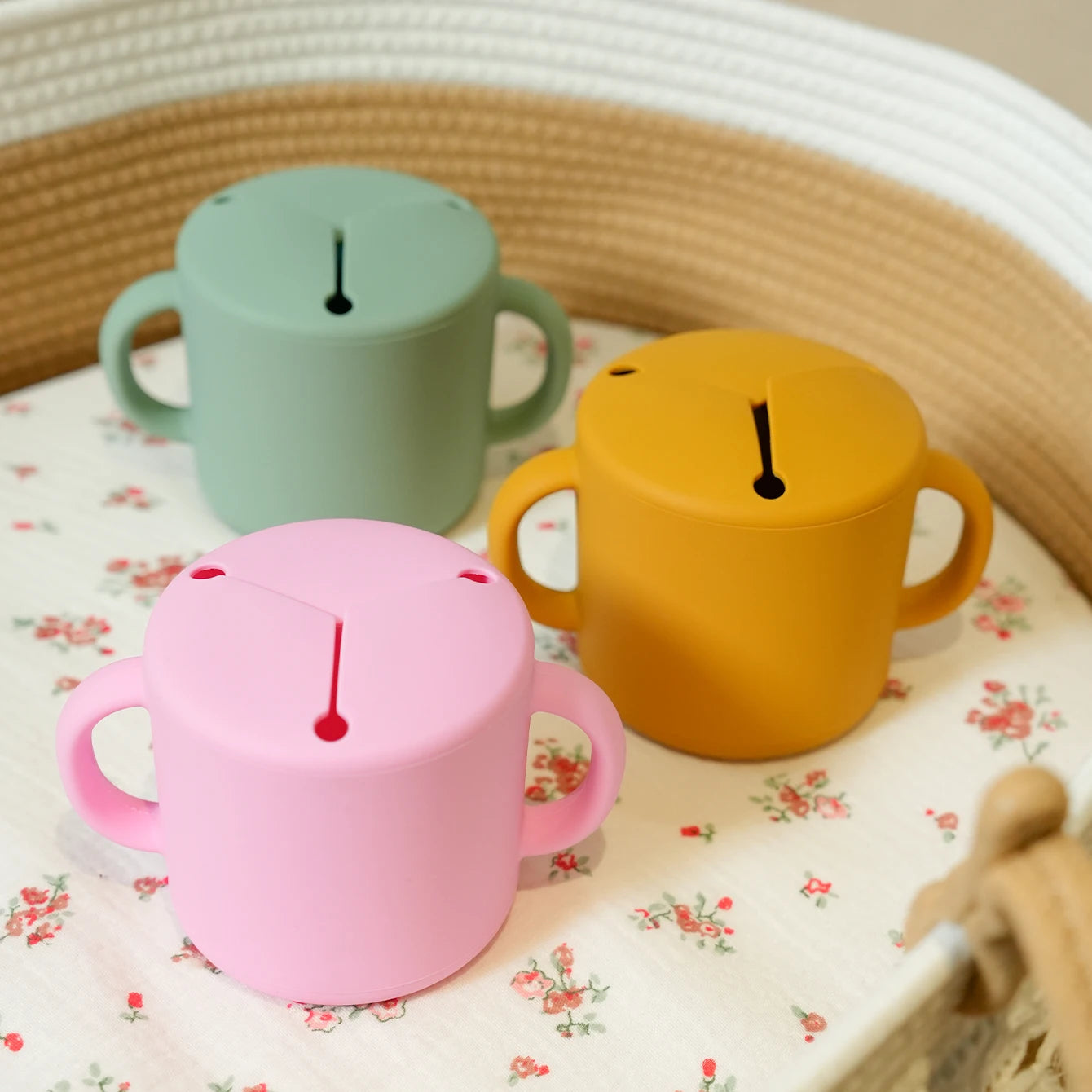 Silicone snack cups on a floral cloth