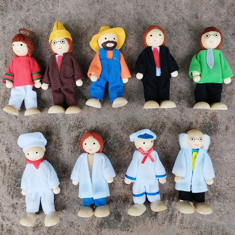 Set of small figurines in various outfits on a textured surface