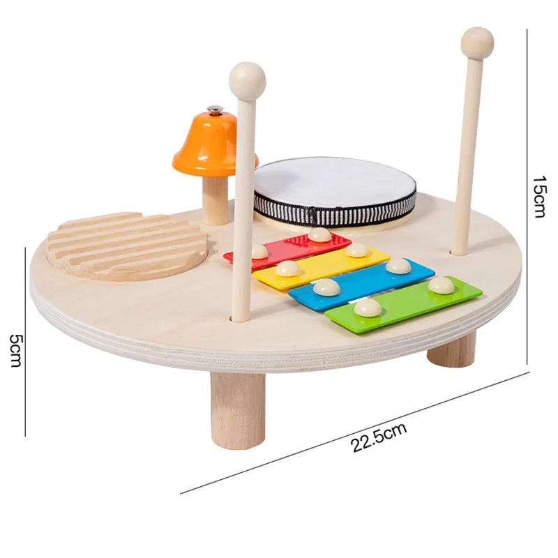 Wooden toy drum set with various components and dimensions on a white background