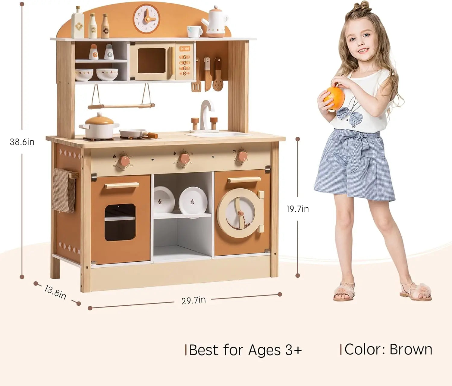 Children's wooden play kitchen set with measurements and a child holding an orange.