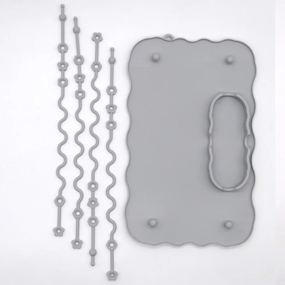 Grey silicone suction placemat with four tether straps