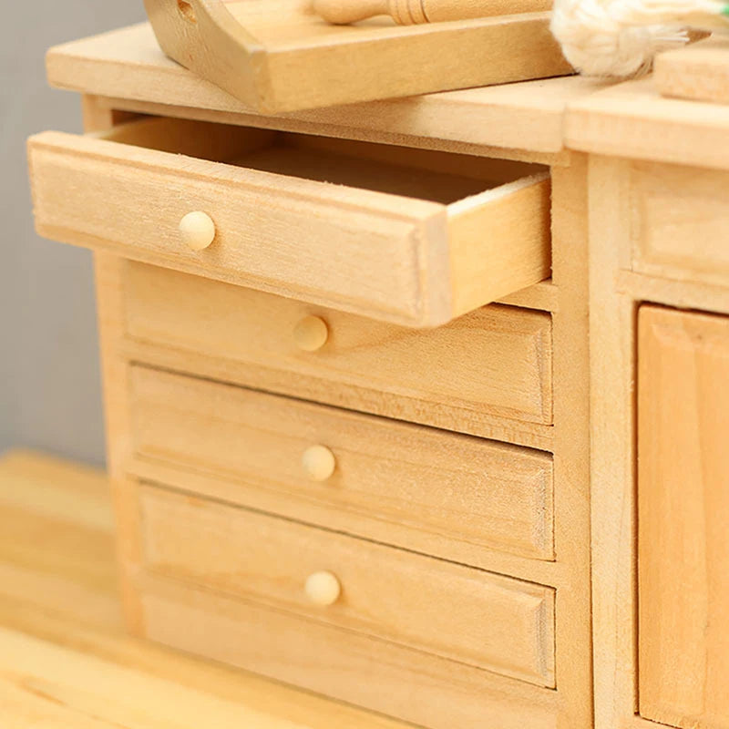 Wooden kitchen cabinet with open drawer and cutting board on top