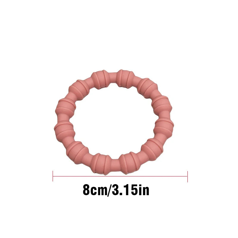A pink ribbed circular ring shown on a white background with a dimension label reading 8cm/3.15in underneath.