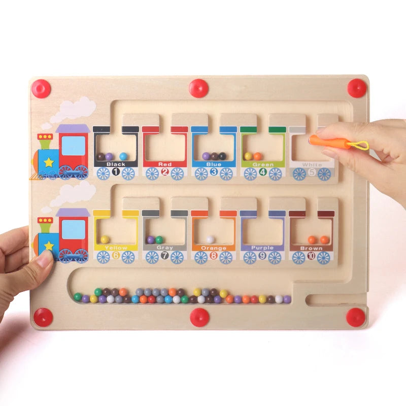 Wooden maze toy with colorful train design and labeled colors on a white background