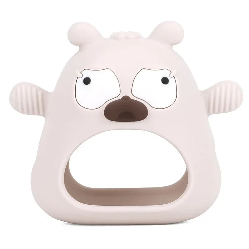 Pink bear-shaped teething ring on a white background