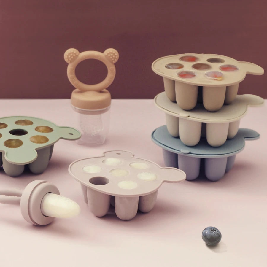 Stacked bear silicone popsicle trays with a fruit feeder and milk pop