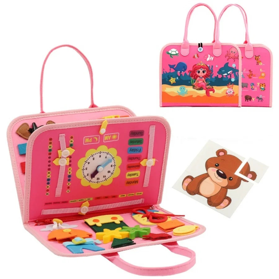 Pink educational toy with various components and a matching carrying case on a white background.