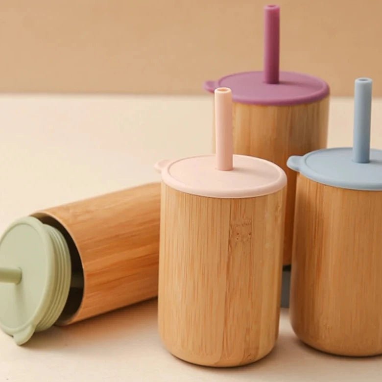 Bamboo Breeze Baby Sippy Cups with leak-proof silicone straws, crafted from bamboo. Ideal for eco-friendly, mess-free feeding for infants and toddlers.