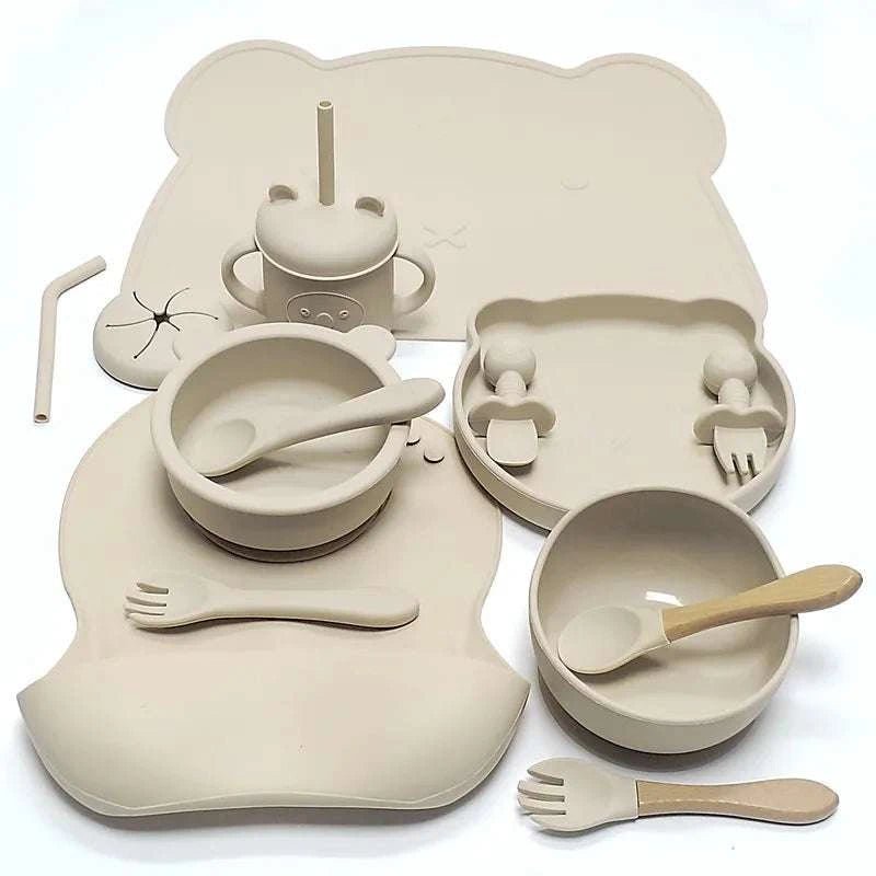 Complete Silicone Baby Tableware Set - 14 Piece Set featuring bowls, plates, spoons, and forks with child-friendly, non-slip design for safe and easy mealtime.
