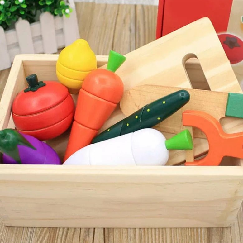 Cut Fruits and Vegetables Wooden Toys in a wooden box, perfect for imaginative play and skill development, from Oliver & Company Montessori Toys.