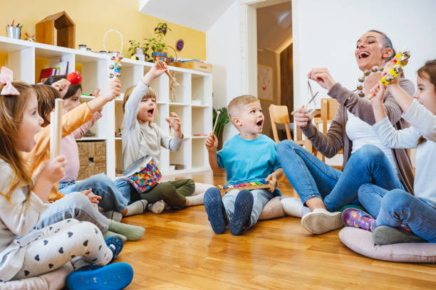 A classroom of children playing with Montessori toys.