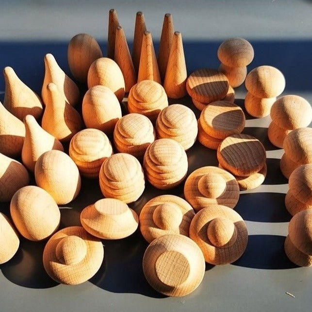 Montessori 6-Piece Natural Wood Loose Parts Set for creative play, featuring six beech wood objects encouraging imagination and exploration in early learning environments.