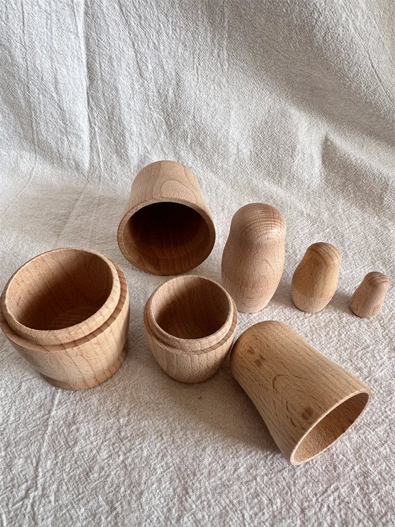 Montessori Beech Wood Rainbow Stacking Dolls: Nesting collectibles showcasing wooden cups and bowls, perfect for imaginative, educational play and skill development.