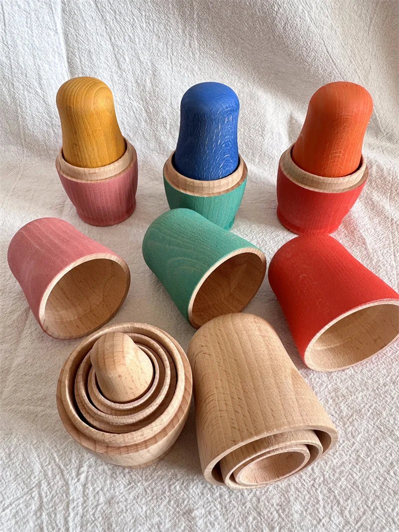 Montessori Beech Wood Rainbow Stacking Dolls: Nesting collectibles showcasing wooden toys designed for open-ended play and learning through stacking and size exploration.