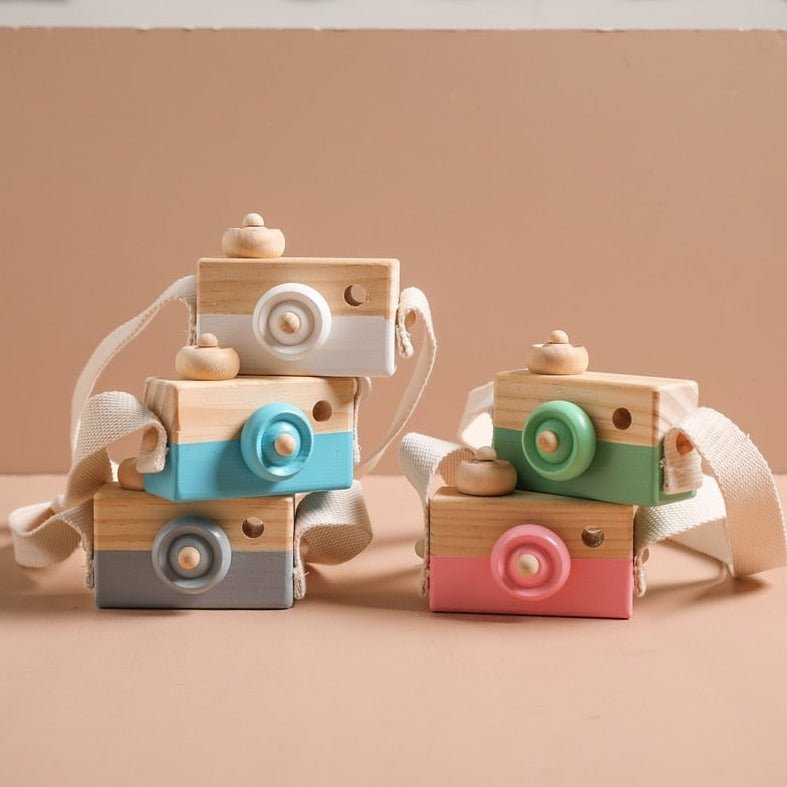 Montessori Classic Wooden Camera made of beech wood with moving knobs, designed for imaginative play and creativity. Part of Oliver & Company Montessori Toys collection.