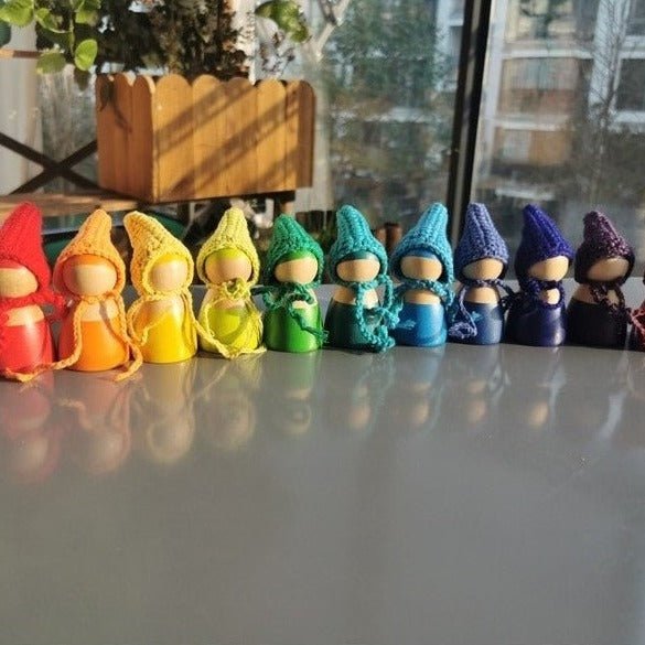 Montessori Crochet Wooden Rainbow Peg Dolls Set with Boards and Hats, featuring handcrafted wooden dolls with colorful crochet hats, ideal for creative and sensory-rich play.