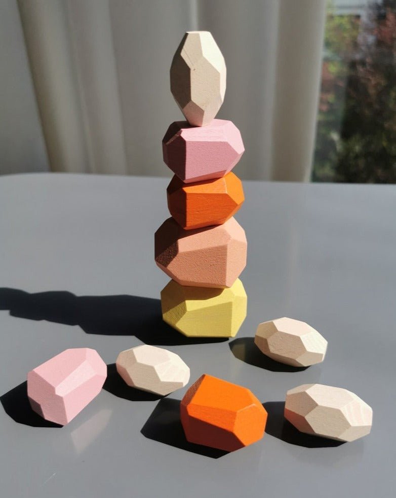 Montessori Large Wooden Balancing Stones for children, featuring colorful, stackable wooden blocks designed to enhance balance, symmetry, and spatial awareness through play.