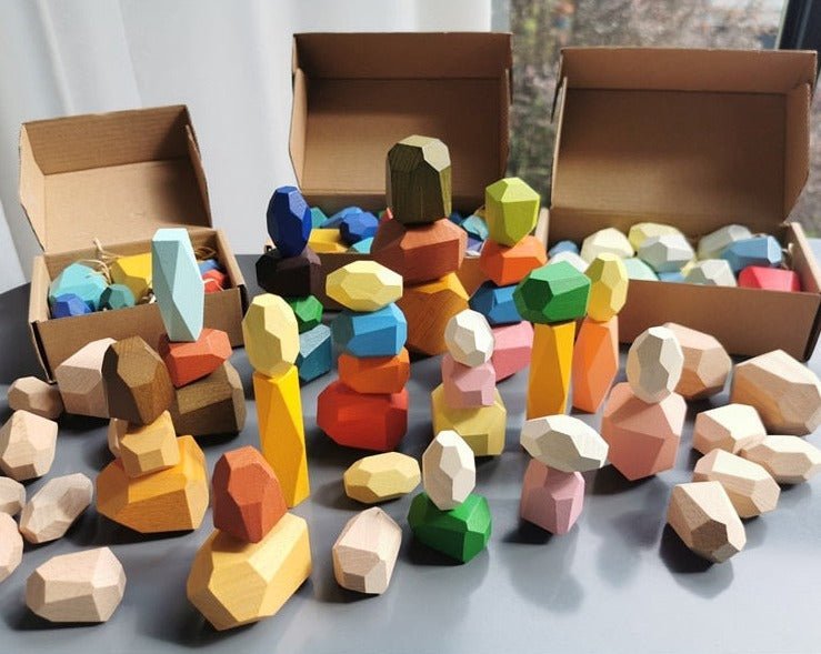 Montessori Large Wooden Balancing Stones set, featuring varied wooden figures and blocks, designed for educational play and developing balance and motor skills.