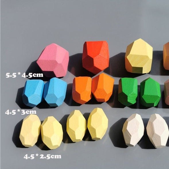 Montessori Large Wooden Balancing Stones for sensory play, featuring various shapes for stacking and building, promoting balance and spatial awareness in children.