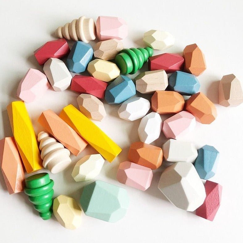 Montessori Large Wooden Balancing Stones for tactile play; crafted from beech and pine, encouraging balance and spatial awareness for child-led, educational fun.