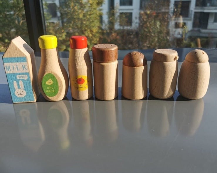 Montessori Natural Wood Kitchen Toy Set featuring wooden shakers and utensils, perfect for imaginative play and skill development through creative cooking activities.