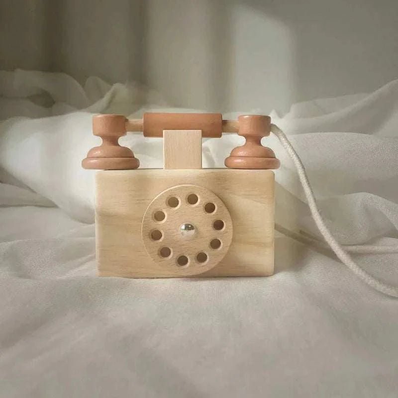 Montessori Old-Fashioned Telephone Toy made of beech wood with a rotary dial, perfect for imaginative play and enhancing fine motor skills.